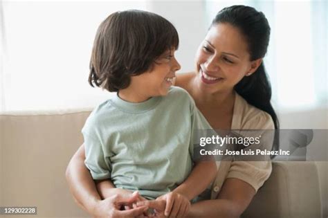 mom sits on sons lap|Mom Sits On Sons Lap stock videos and footage.